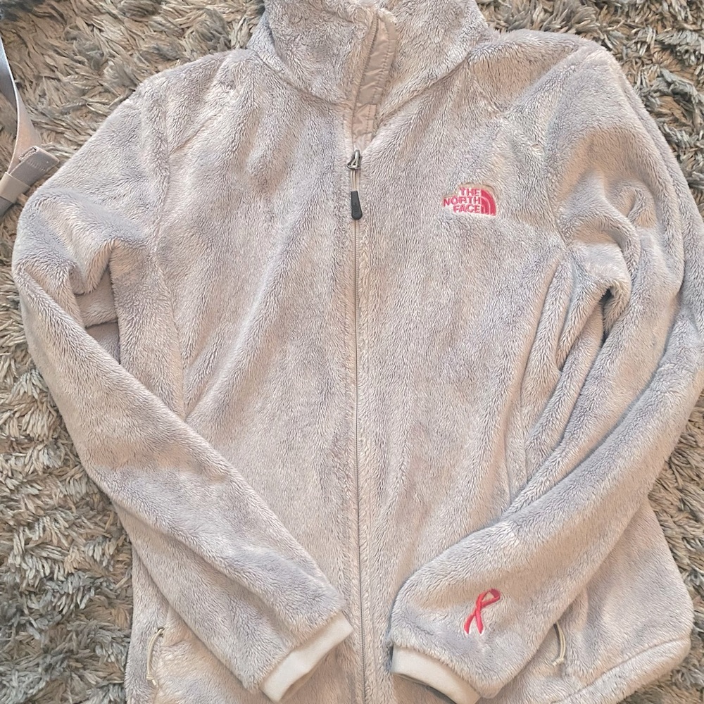 Women’s north face zip coat. Great condition.